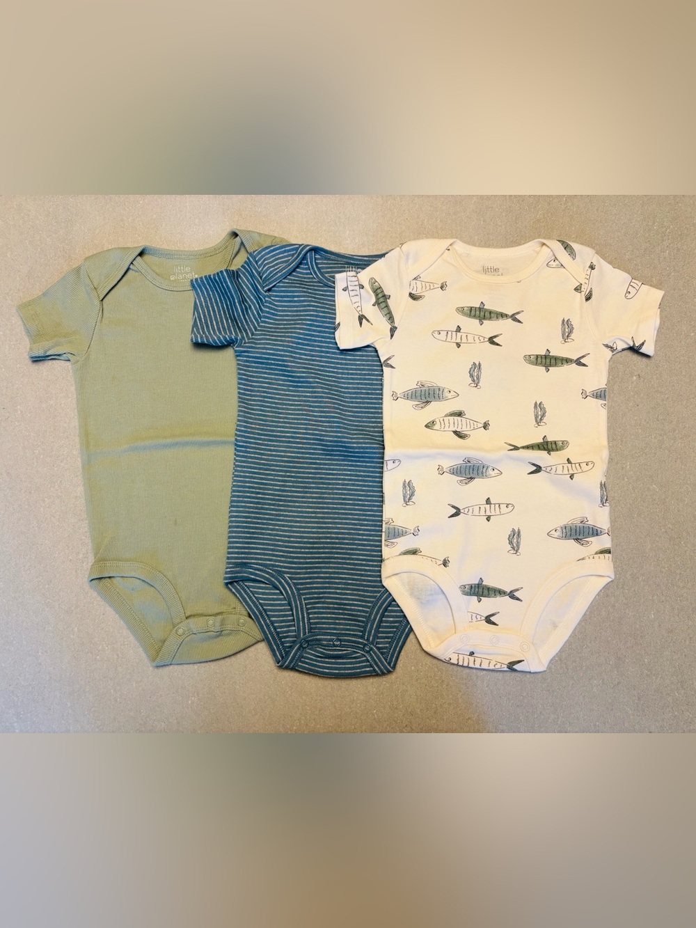 Carter’s Little Planet Bodysuits